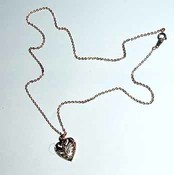 Gold Tone Heart Shaped Filigree Necklace